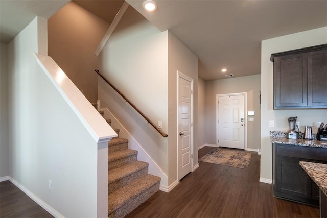 foyer entrance featuring dark hardwood / wood-style flooring