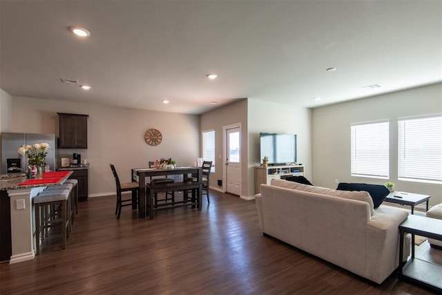 living room with dark wood-type flooring