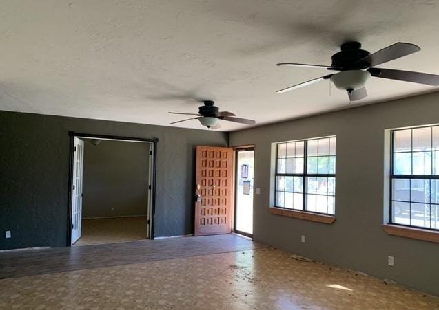 spare room featuring ceiling fan