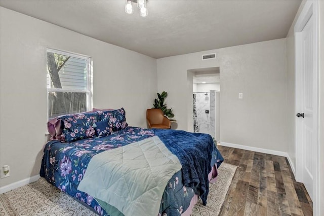 bedroom featuring hardwood / wood-style floors