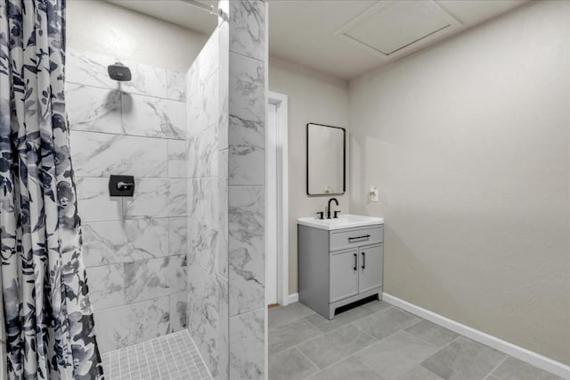 bathroom featuring vanity and a shower with shower curtain