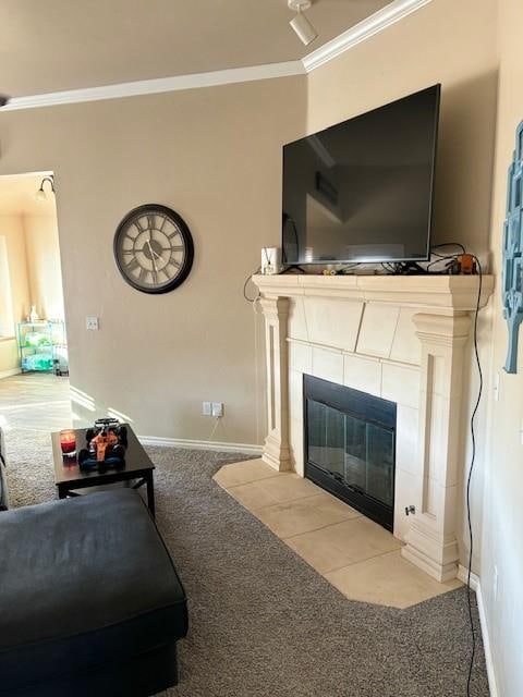 carpeted living room with crown molding and a tile fireplace