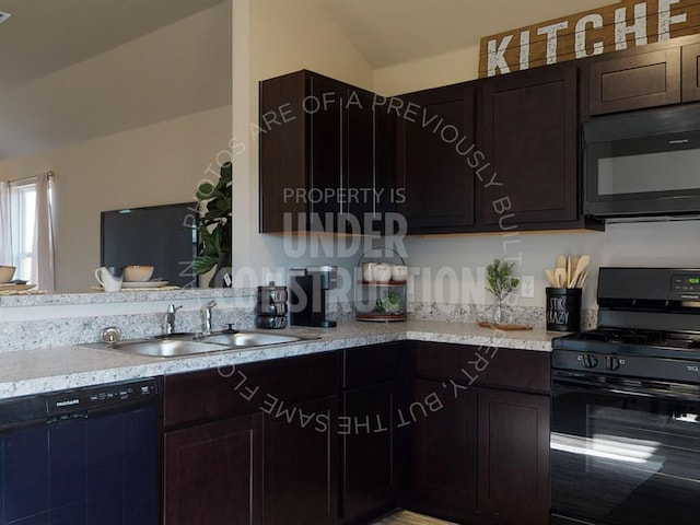 kitchen with black appliances, dark brown cabinets, sink, and vaulted ceiling