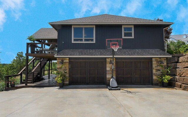 view of front of property with a garage