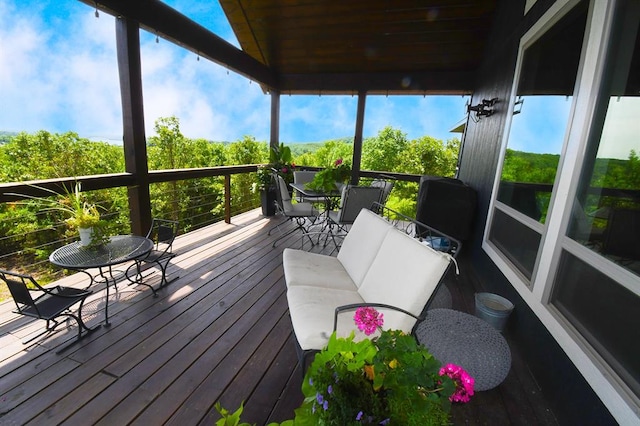 sunroom / solarium with lofted ceiling