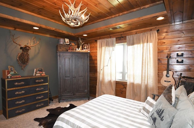 carpeted bedroom featuring wood ceiling