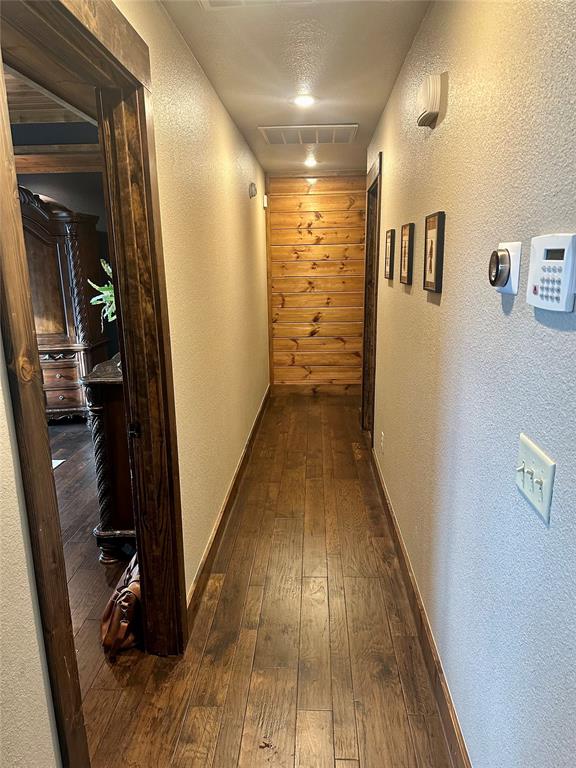 hall featuring dark hardwood / wood-style flooring