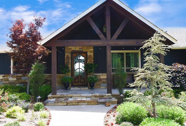 property entrance featuring covered porch