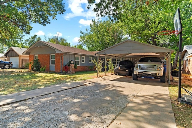 single story home with a carport and a front lawn