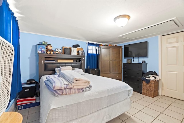 bedroom featuring light tile patterned floors