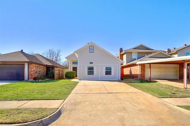 view of front property with a garage and a front yard