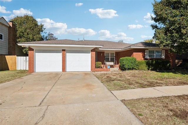 ranch-style house featuring a garage