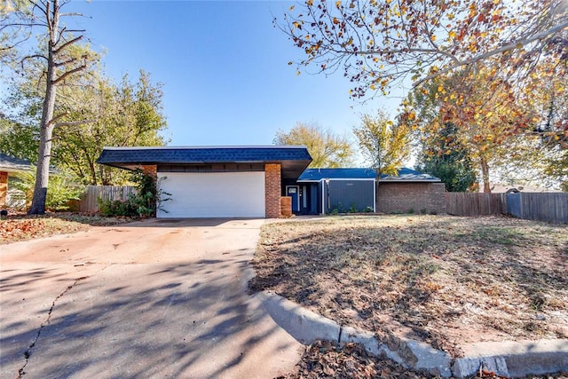 ranch-style home with a garage