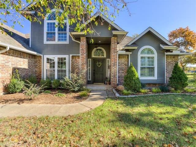 view of front of house with a front lawn