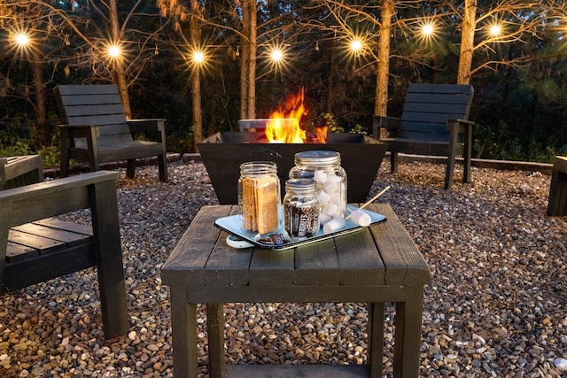 view of patio / terrace with an outdoor fire pit