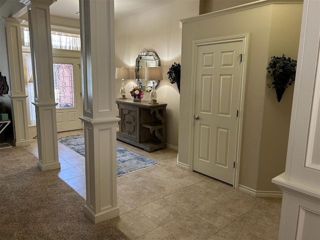 tiled entryway with decorative columns