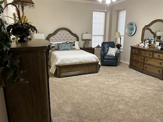 bedroom featuring carpet floors and ornamental molding