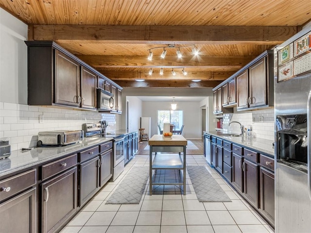 kitchen featuring tasteful backsplash, stainless steel appliances, wooden ceiling, and dark brown cabinetry