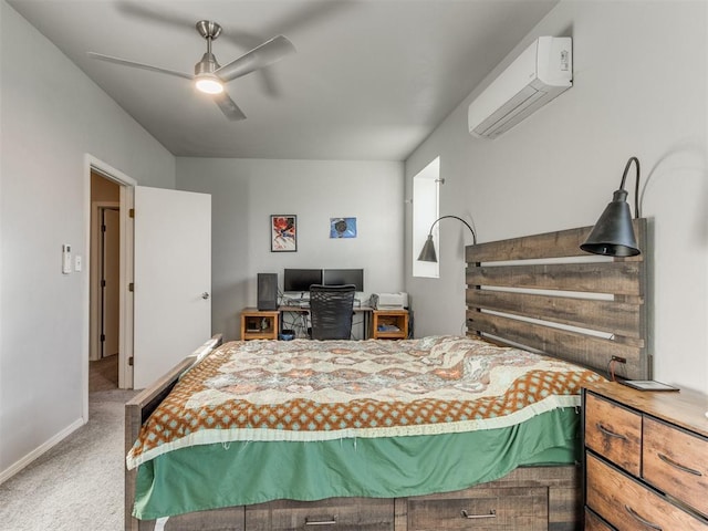 carpeted bedroom with ceiling fan and a wall mounted AC