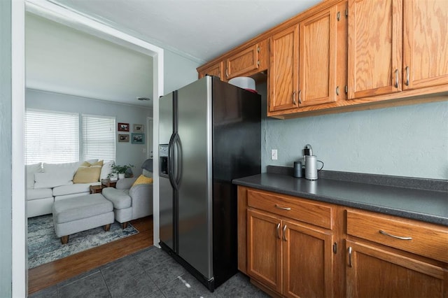 kitchen with stainless steel fridge with ice dispenser