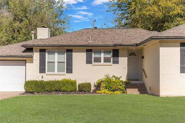 single story home with a garage and a front lawn