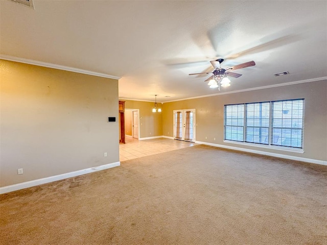 unfurnished room featuring ceiling fan with notable chandelier, light colored carpet, and ornamental molding