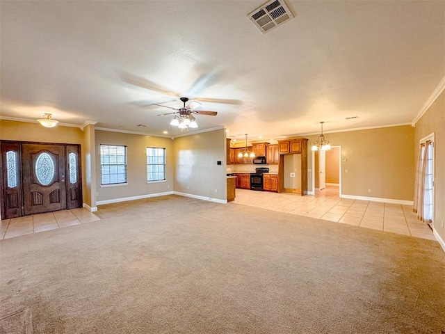 unfurnished living room featuring light tile patterned floors, ceiling fan with notable chandelier, and ornamental molding