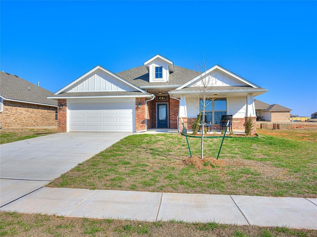 craftsman-style home featuring a garage and a front lawn