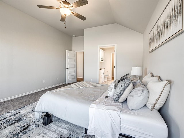 bedroom featuring carpet flooring, connected bathroom, ceiling fan, and lofted ceiling