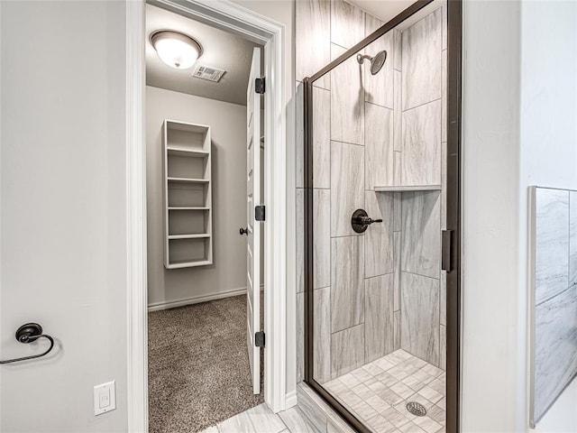 bathroom with an enclosed shower