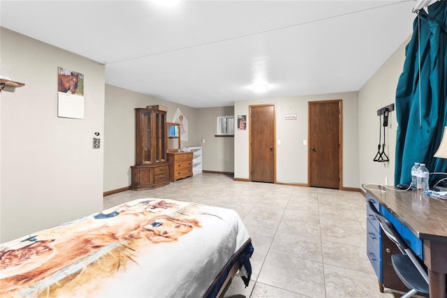 bedroom featuring light tile patterned floors