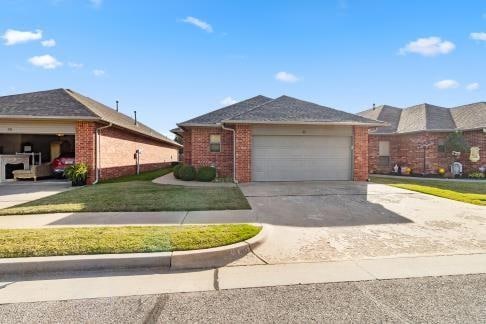 ranch-style home featuring a front lawn and a garage