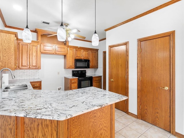 kitchen featuring sink, hanging light fixtures, ornamental molding, and black appliances