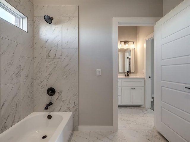 bathroom featuring vanity and tiled shower / bath combo