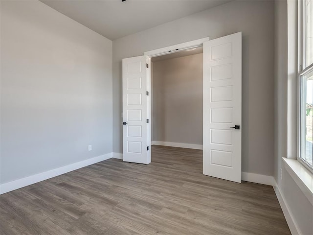 unfurnished bedroom with light hardwood / wood-style floors