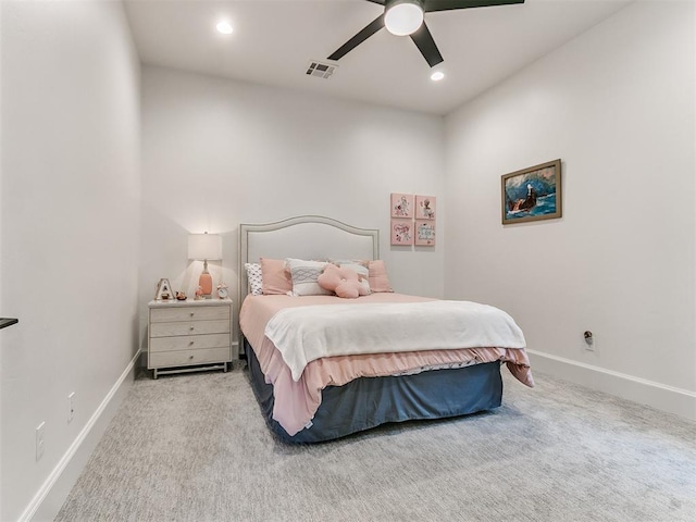 bedroom with light carpet and ceiling fan