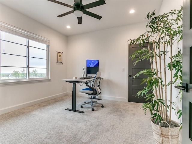 office space with ceiling fan and carpet floors