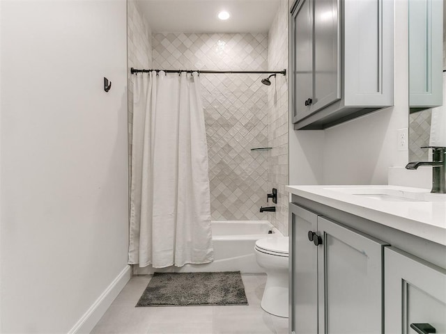 full bathroom with toilet, shower / tub combo with curtain, vanity, and tile patterned flooring