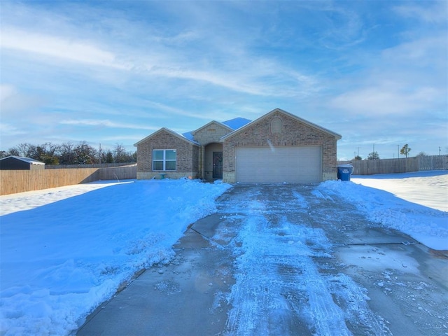 single story home with a garage