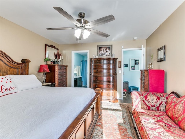 bedroom with ensuite bath and ceiling fan