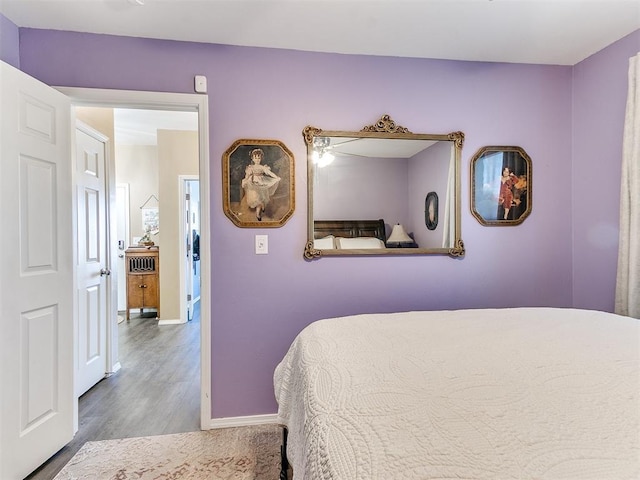 bedroom with hardwood / wood-style flooring