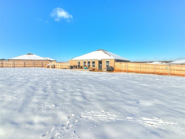 view of yard covered in snow