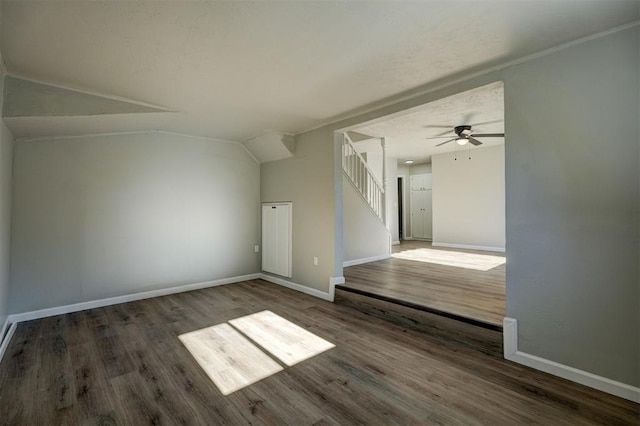 bonus room with dark hardwood / wood-style floors, ceiling fan, and lofted ceiling