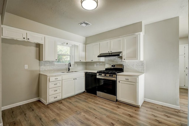 kitchen with gas stove, sink, dishwasher, white cabinets, and light wood-type flooring