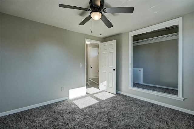 unfurnished bedroom featuring carpet, ceiling fan, and a closet