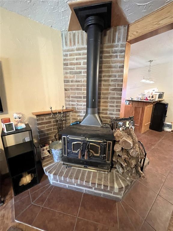 room details featuring a wood stove