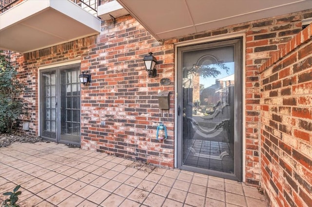 property entrance featuring french doors