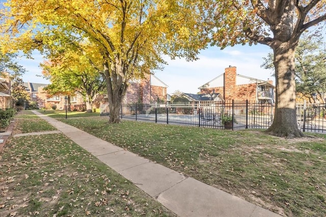 view of community with a yard