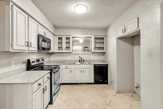 kitchen featuring light stone countertops, white cabinetry, sink, a textured ceiling, and black appliances