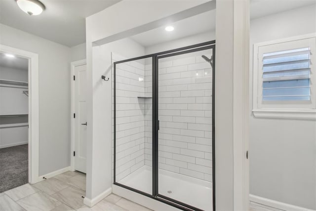 bathroom with an enclosed shower